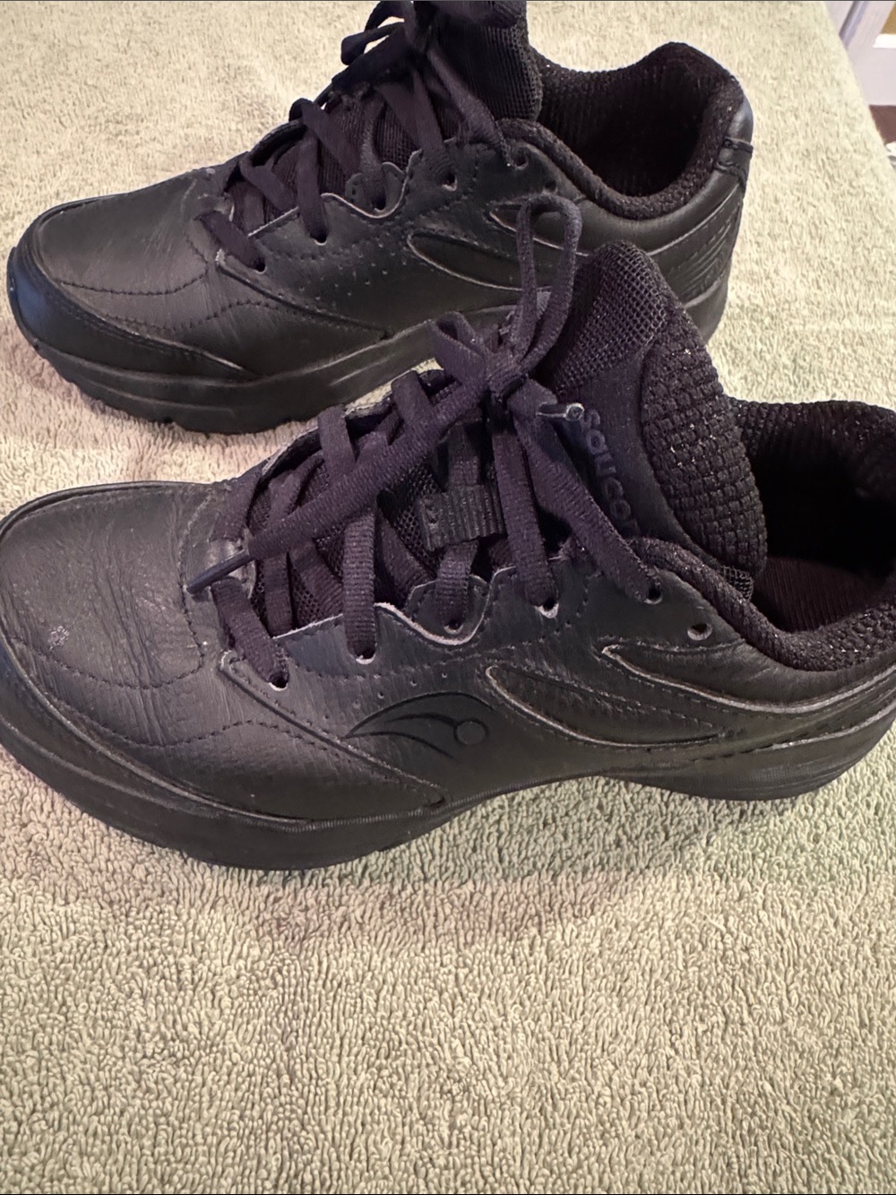 Saucony women’s Black Lace-Up Comfort Sneakers walkers.